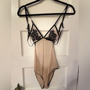 Sheer Pink And Black Floral Lace Body Suit